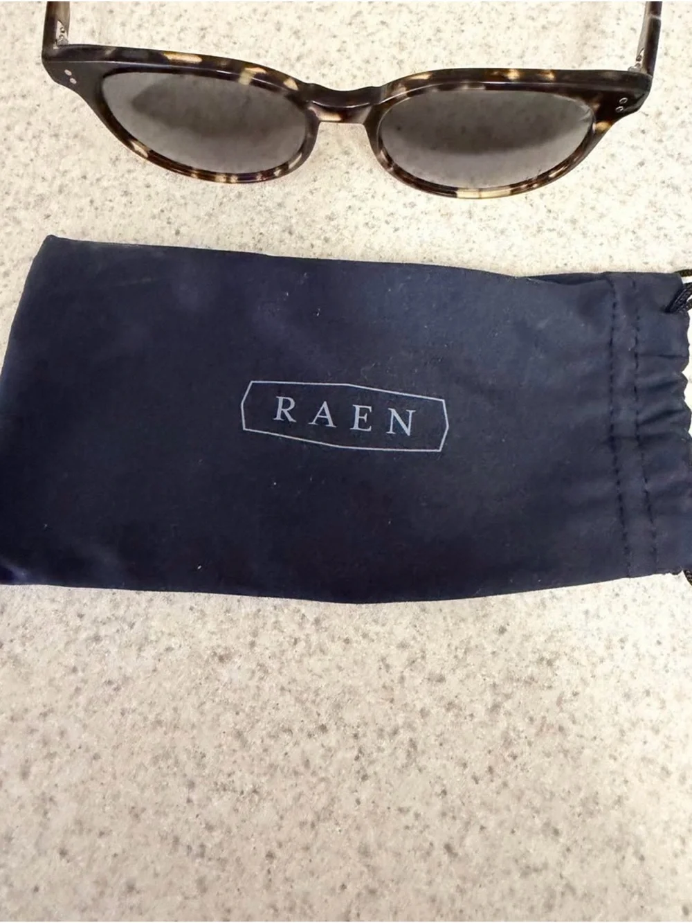 RAEN Tortoiseshell Round Sunglasses with Dark Lenses